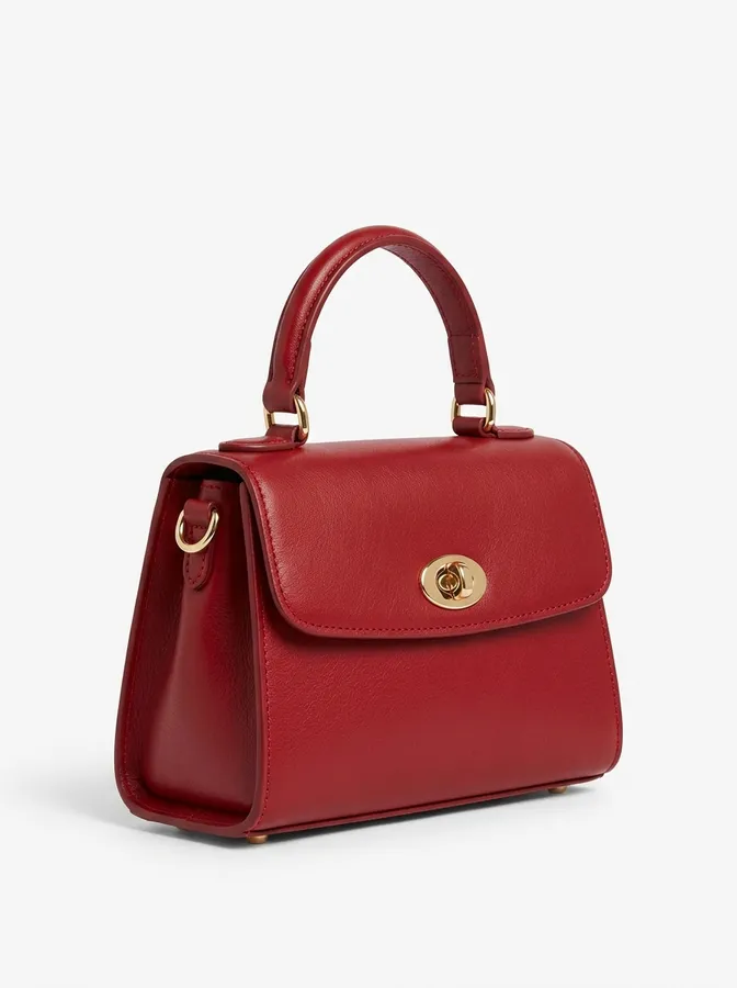 Product photo of a red leather top-handle handbag used as the third reference